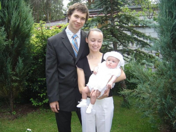 Marika z rodzicami chrzesnymi